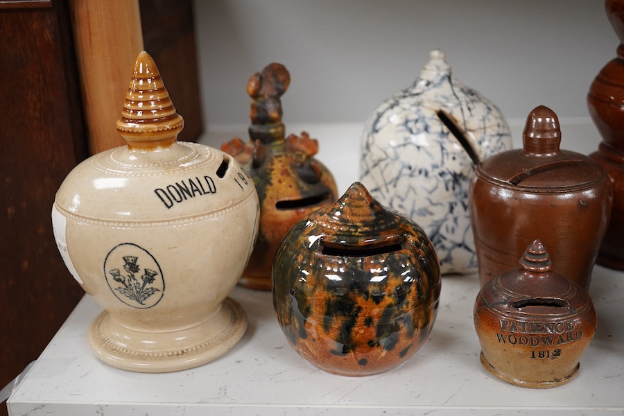 A group of ten various 19th century stoneware money boxes, tallest 19cm. Condition - varies